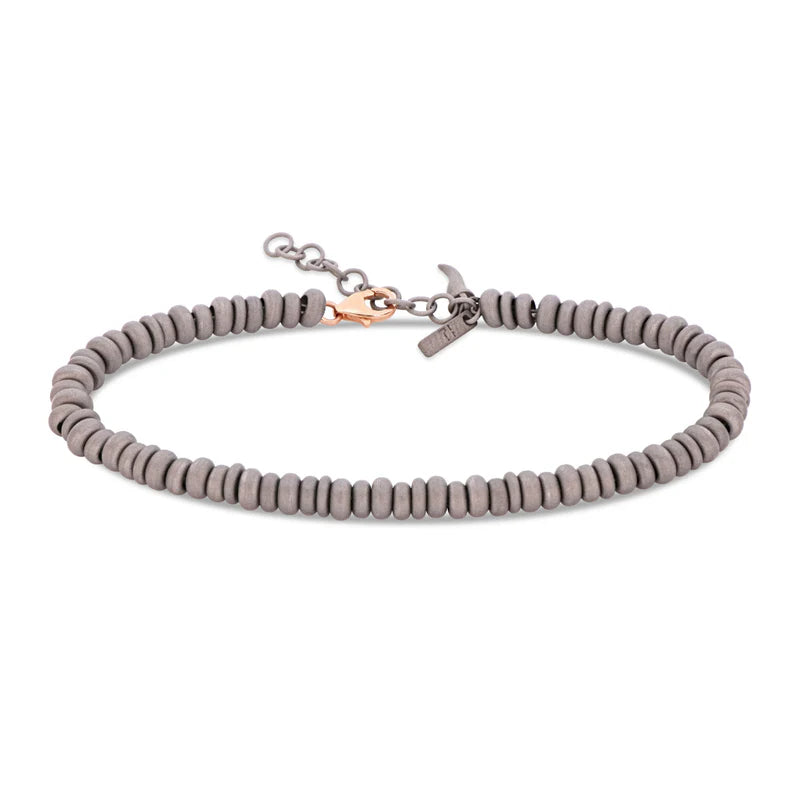 Mano J BRACCIALE UOMO CON ANELLINI IN TITANIO E ORO ROSSO 9 KT
