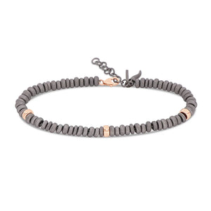 Mano J BRACCIALE UOMO CON ANELLINI IN TITANIO E ORO ROSSO 9 KT
