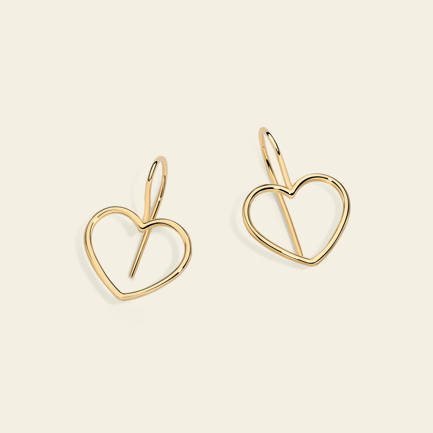 Marco Gerbella orecchini a gancio con cuore a filo oro giallo